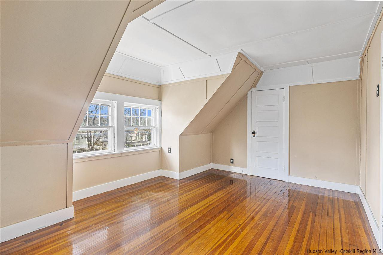 Undisclosed Address Kingston, NY 12401 - Photo 32 of 34 a view of an empty room with wooden floor and a window