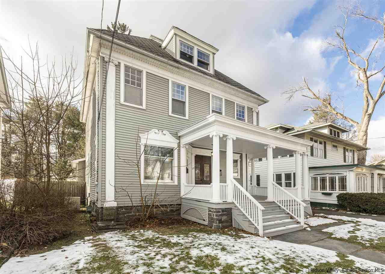 Undisclosed Address Kingston, NY 12401 - Photo 4 of 34 a front view of a house with a yard