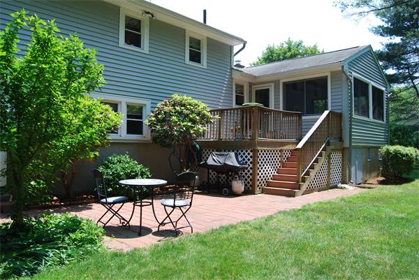 76 Joyce Road Framingham, MA 01701 - Photo 11 of 22 a house view with a garden space
