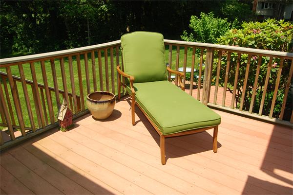 76 Joyce Road Framingham, MA 01701 - Photo 19 of 22 a wooden bench sitting in front of a yard