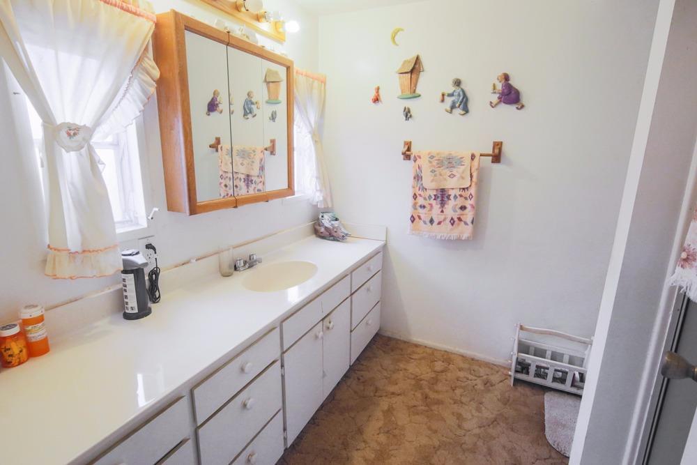 15655 Jones Road White City, OR 97503 - Photo 25 of 28 a bathroom with a double vanity sink mirror and