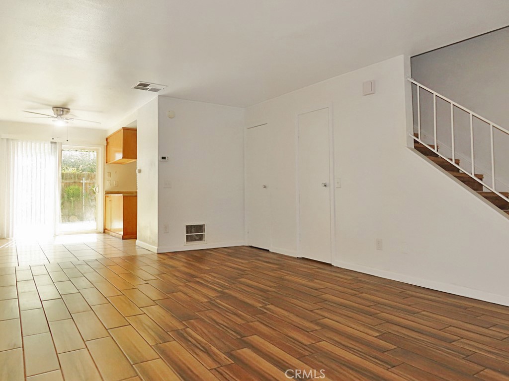1373 Wheaton Way Riverside, CA 92507 - Photo 11 of 34 a view of an empty room with glass door