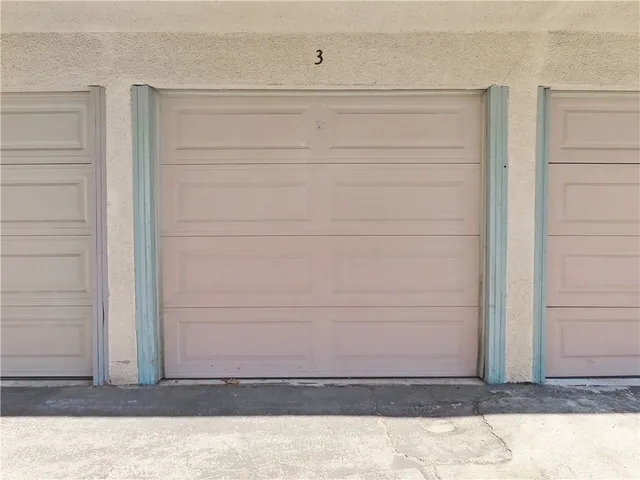 a view of a swimming pool and a yard