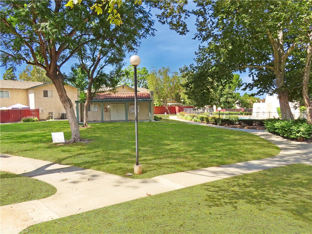1373 Wheaton Way Riverside, CA 92507 - Photo 32 of 34 a view of a playground with a tree in the patio