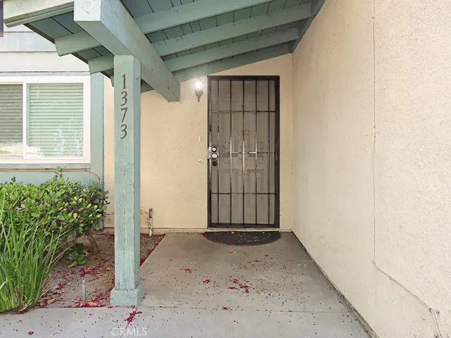 a view of a house with a wooden door