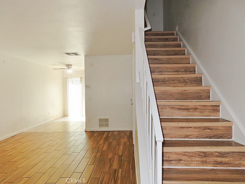 1373 Wheaton Way Riverside, CA 92507 - Photo 8 of 34 a view of an entryway with wooden floor