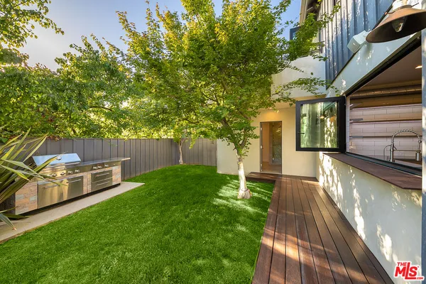 a view of a backyard with a garden