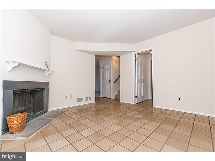 205 Chase Road Wayne, PA 19087 - Photo 2 of 23 a view of an empty room with glass door