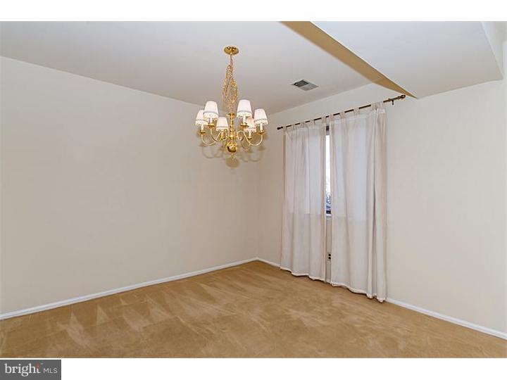 205 Chase Road Wayne, PA 19087 - Photo 17 of 23 a view of a chandelier in big room