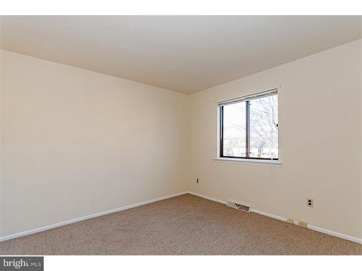 205 Chase Road Wayne, PA 19087 - Photo 18 of 23 an empty room with windows