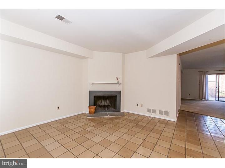 205 Chase Road Wayne, PA 19087 - Photo 3 of 23 a view of an empty room and window