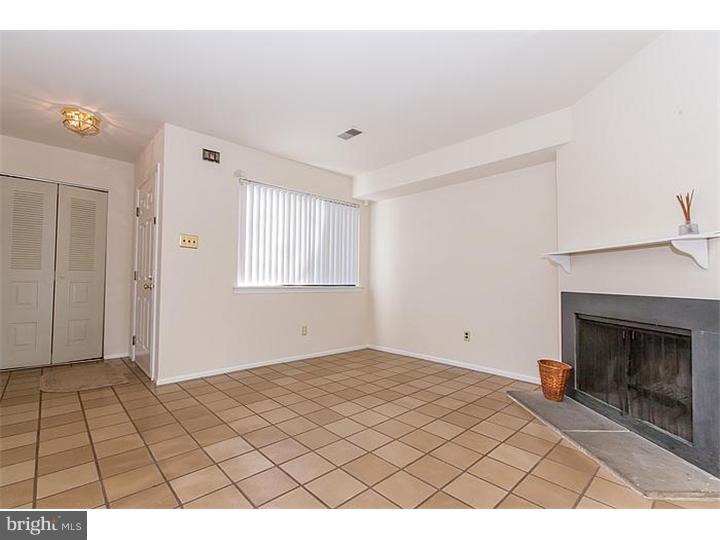 205 Chase Road Wayne, PA 19087 - Photo 6 of 23 a view of an empty room and window