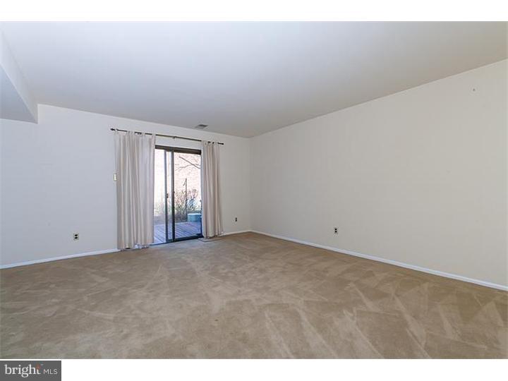 205 Chase Road Wayne, PA 19087 - Photo 10 of 23 a view of an empty room with window