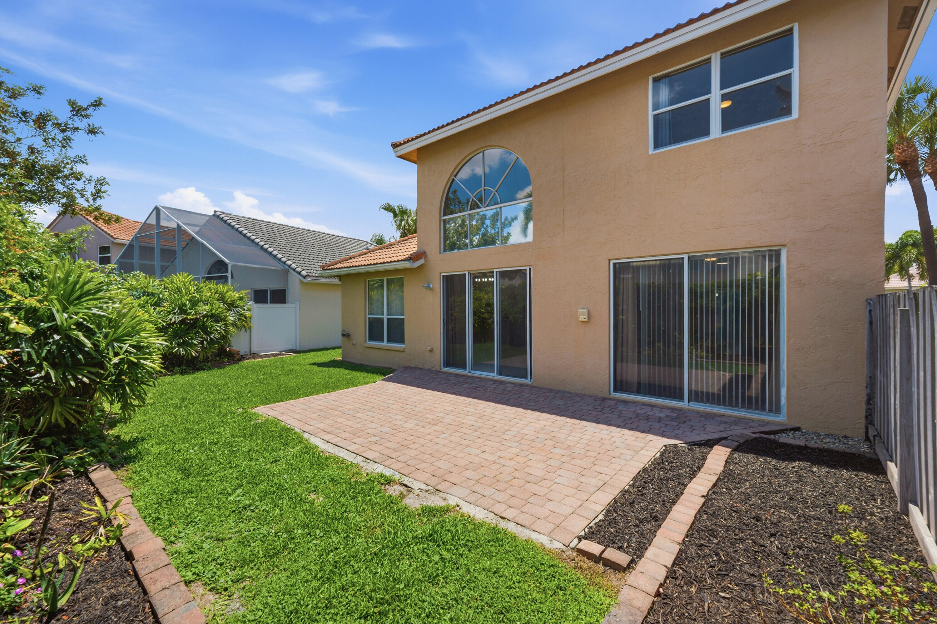 18474 Old Princeton Lane Boca Raton, FL 33498 - Photo 41 of 46 front view of a house with a yard