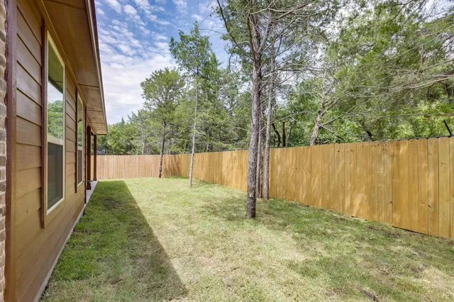 a view of a porch with a backyard