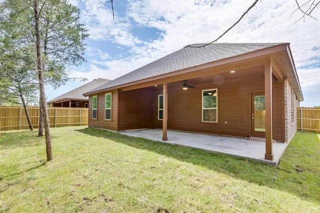 a view of backyard with green space