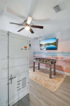 a view of a hallway with seating space