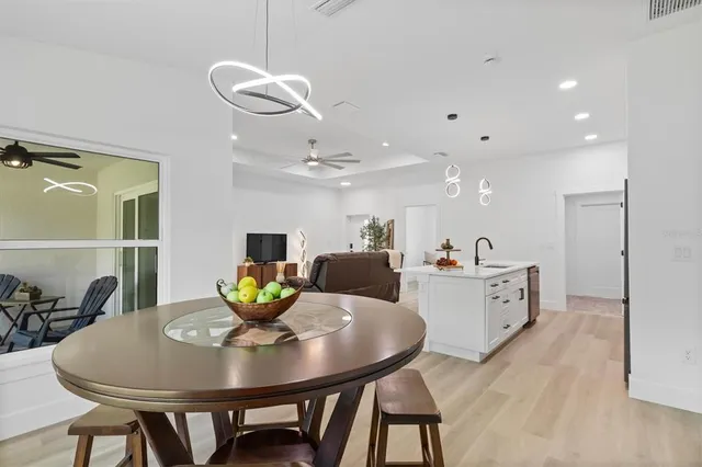 a view of a dining room with furniture