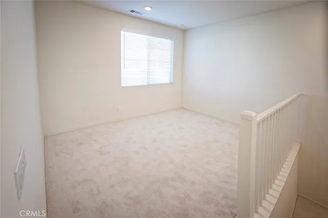 a view of a storage & utility room with closet