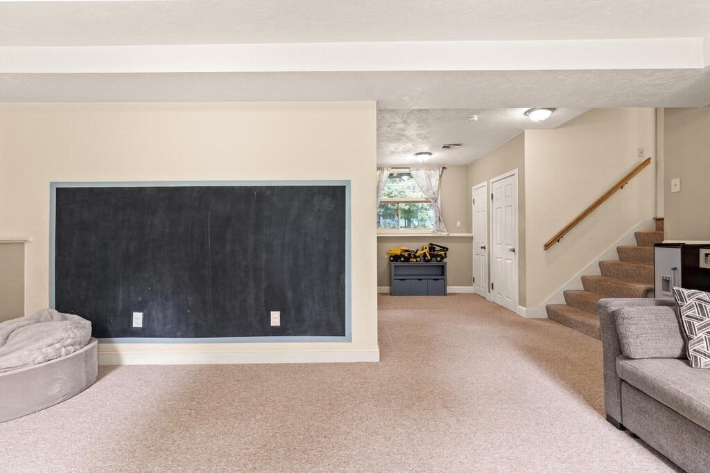 459 Winch Street Framingham, MA 01701 - Photo 11 of 34 a living room with furniture and a entrance