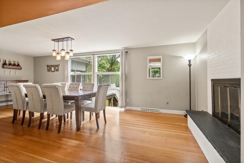 459 Winch Street Framingham, MA 01701 - Photo 13 of 34 a view of a dining room with furniture and wooden floor