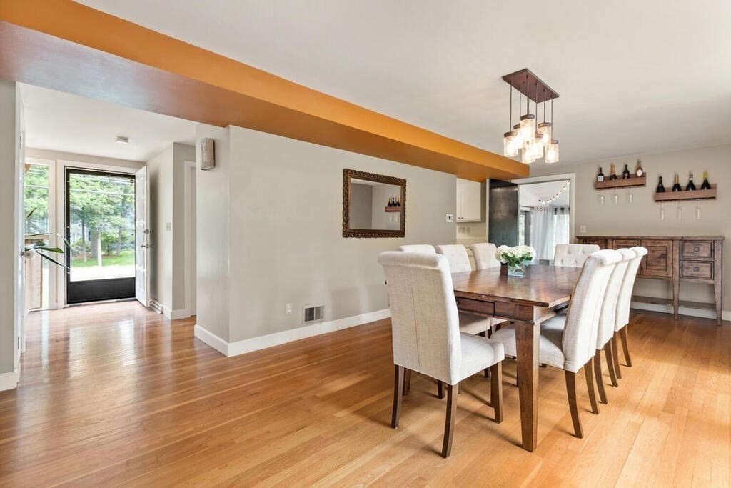 459 Winch Street Framingham, MA 01701 - Photo 14 of 34 a view of a dining room with furniture window and wooden floor