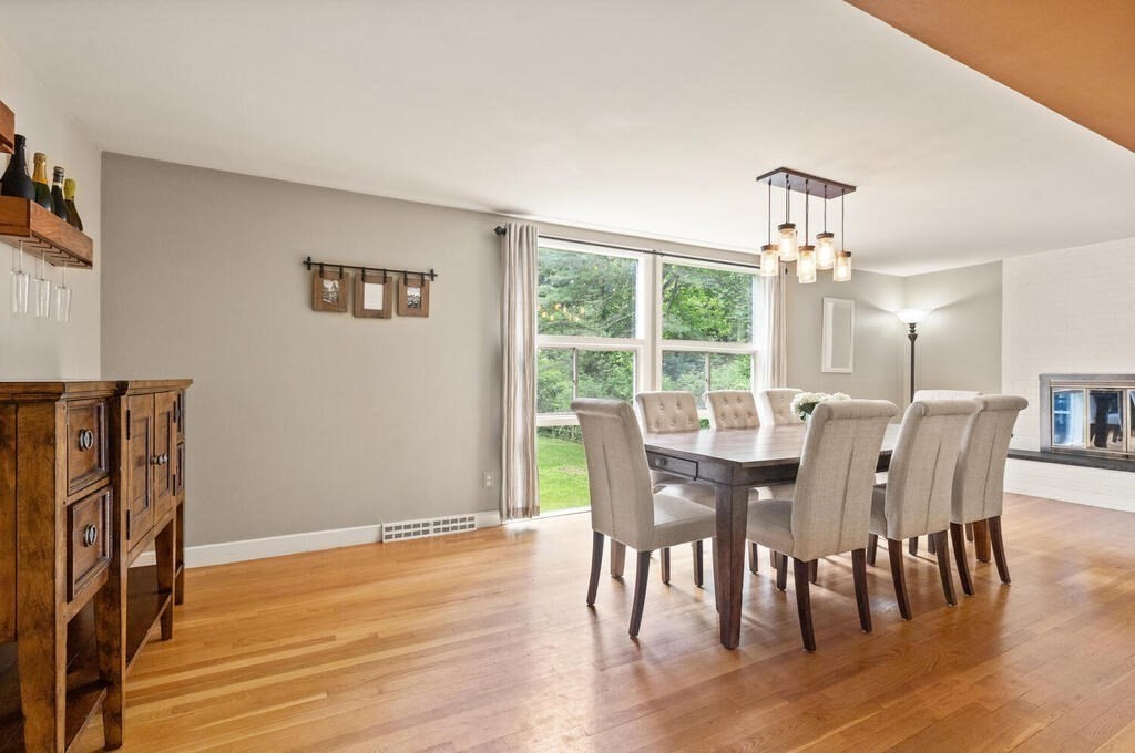 459 Winch Street Framingham, MA 01701 - Photo 15 of 34 a view of a dining room with furniture window and wooden floor