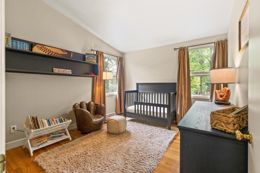 459 Winch Street Framingham, MA 01701 - Photo 27 of 34 a bedroom with furniture and a window