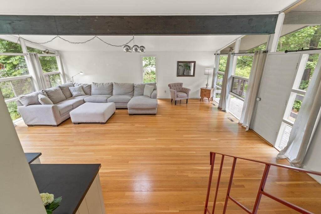 459 Winch Street Framingham, MA 01701 - Photo 9 of 34 a living room with furniture and a flat screen tv
