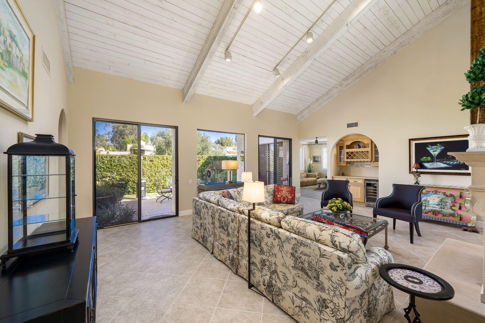 818 Inverness Drive Rancho Mirage, CA 92270 - Photo 12 of 43 a living room with furniture and a window