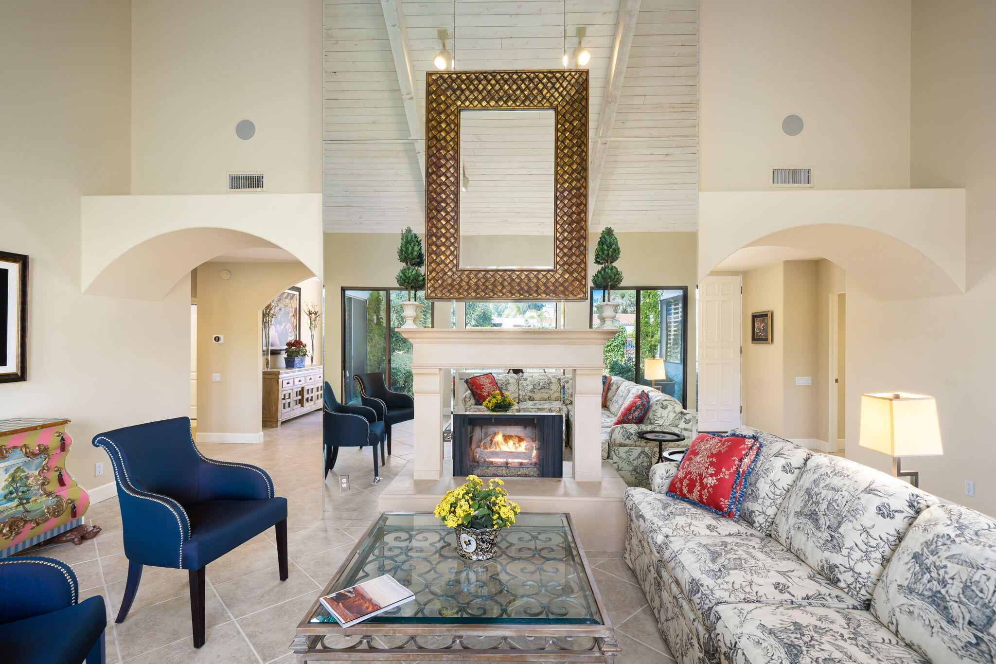 818 Inverness Drive Rancho Mirage, CA 92270 - Photo 13 of 43 a living room with furniture and a fireplace