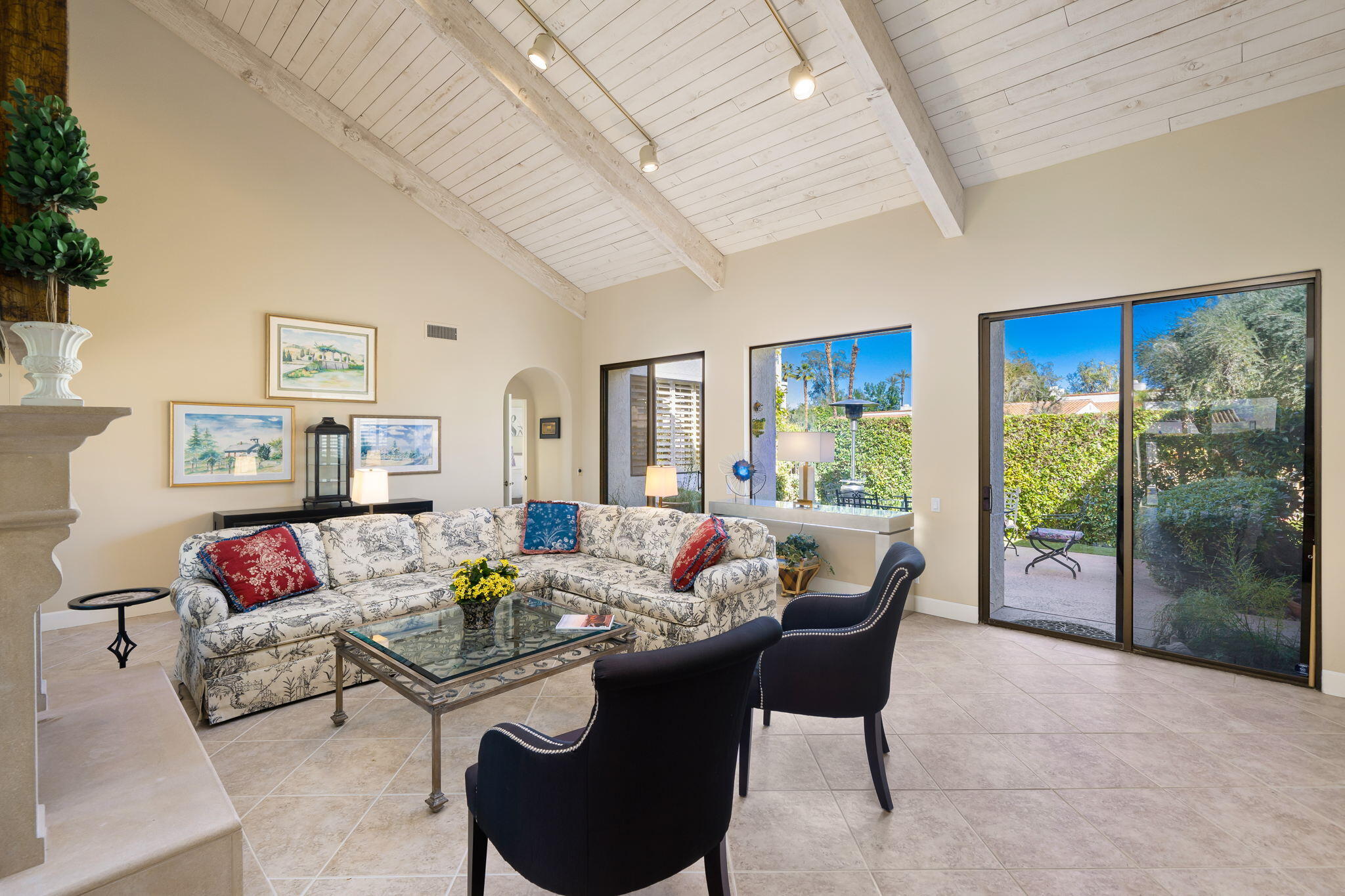 818 Inverness Drive Rancho Mirage, CA 92270 - Photo 15 of 43 a living room with furniture and a large window