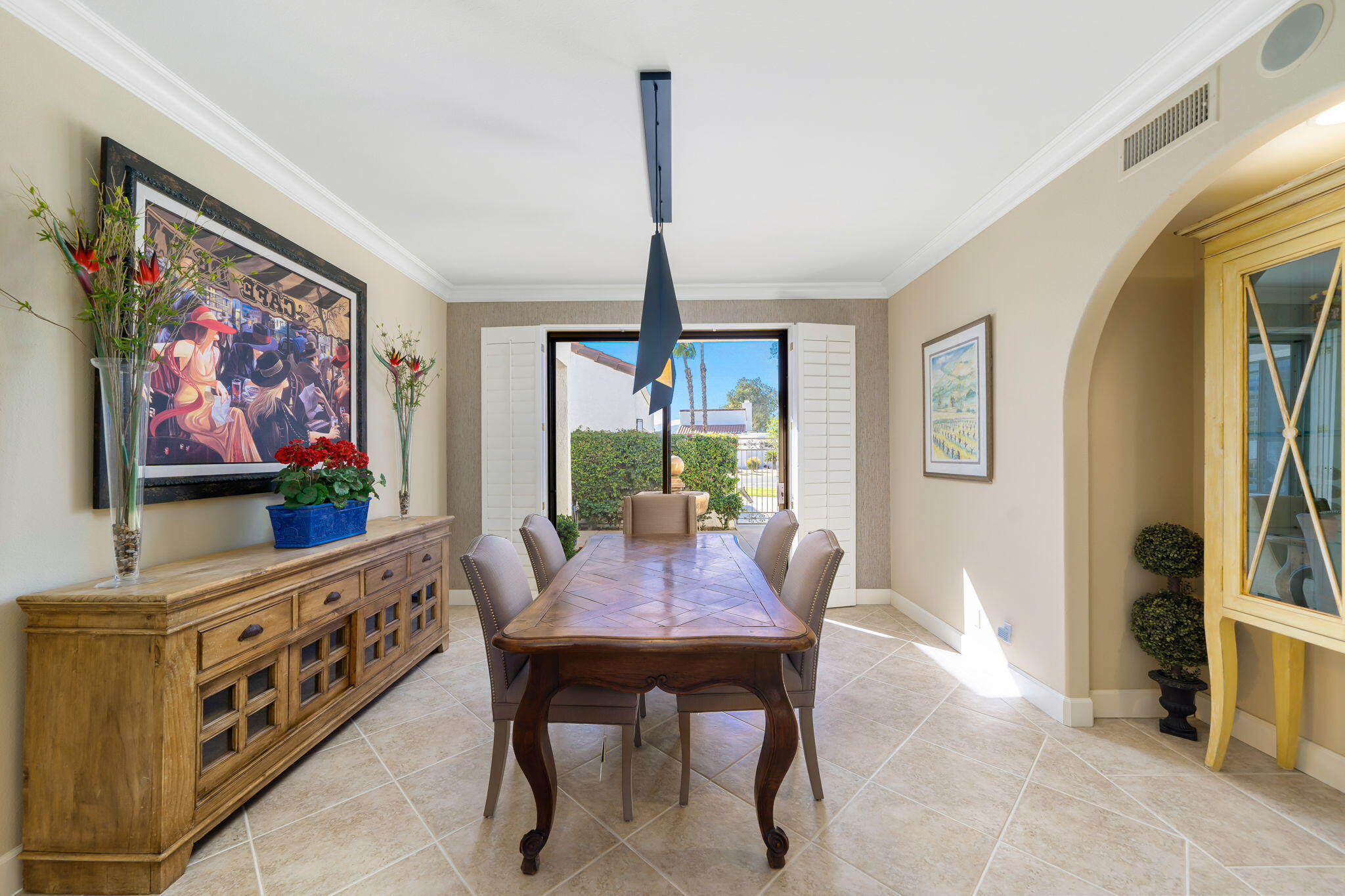 818 Inverness Drive Rancho Mirage, CA 92270 - Photo 17 of 43 a living room with furniture and a flat screen tv