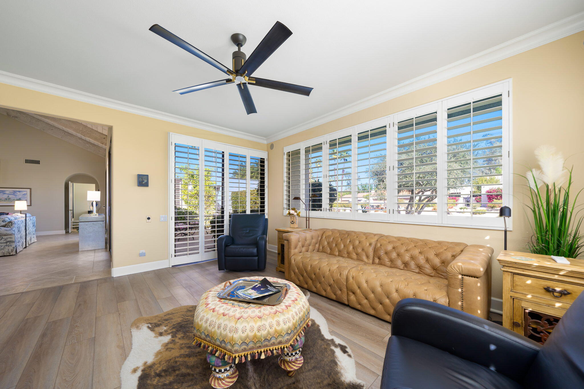 818 Inverness Drive Rancho Mirage, CA 92270 - Photo 25 of 43 a living room with furniture and a large window