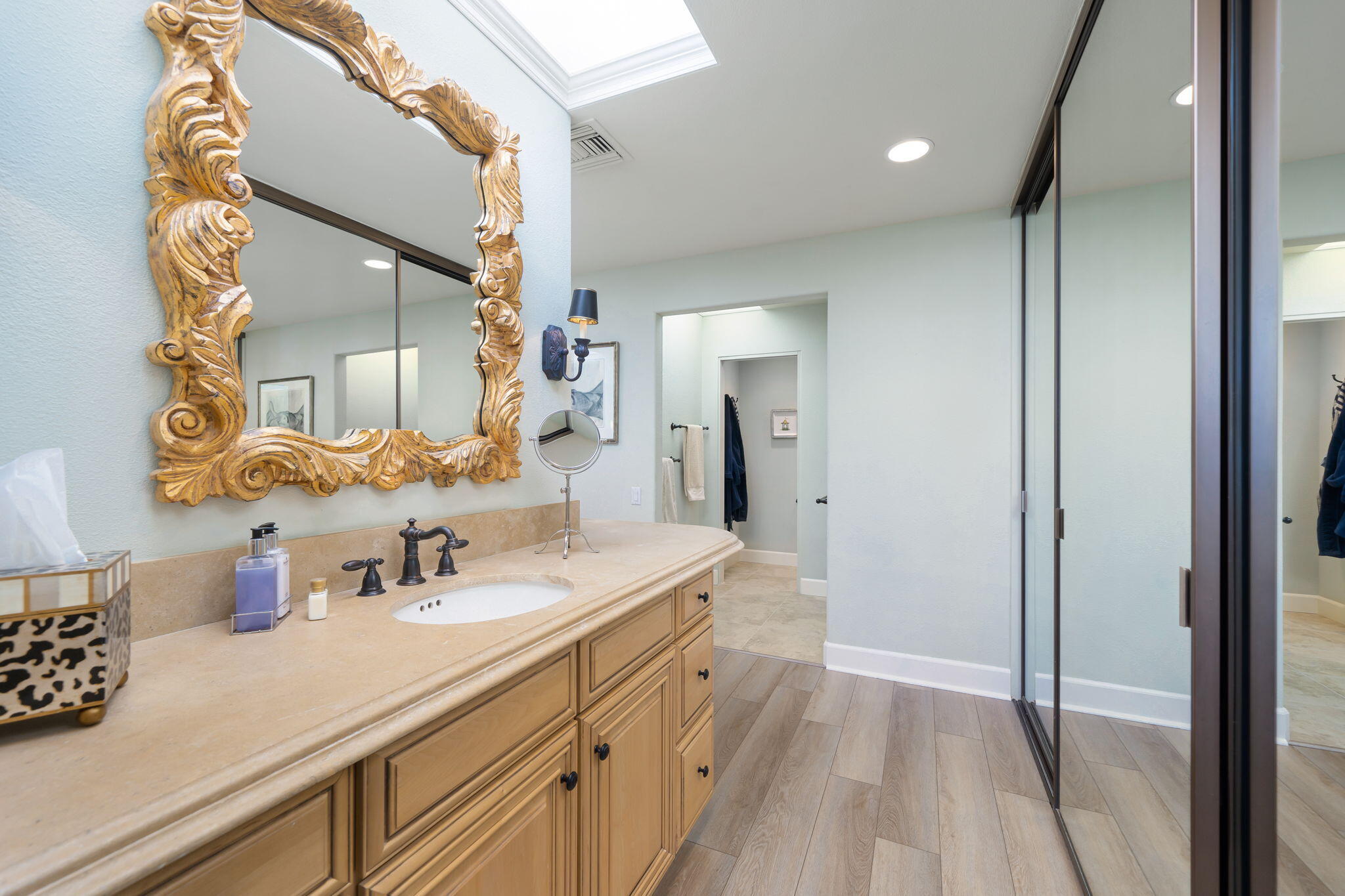 818 Inverness Drive Rancho Mirage, CA 92270 - Photo 28 of 43 a spacious bathroom with a sink double vanity and mirror