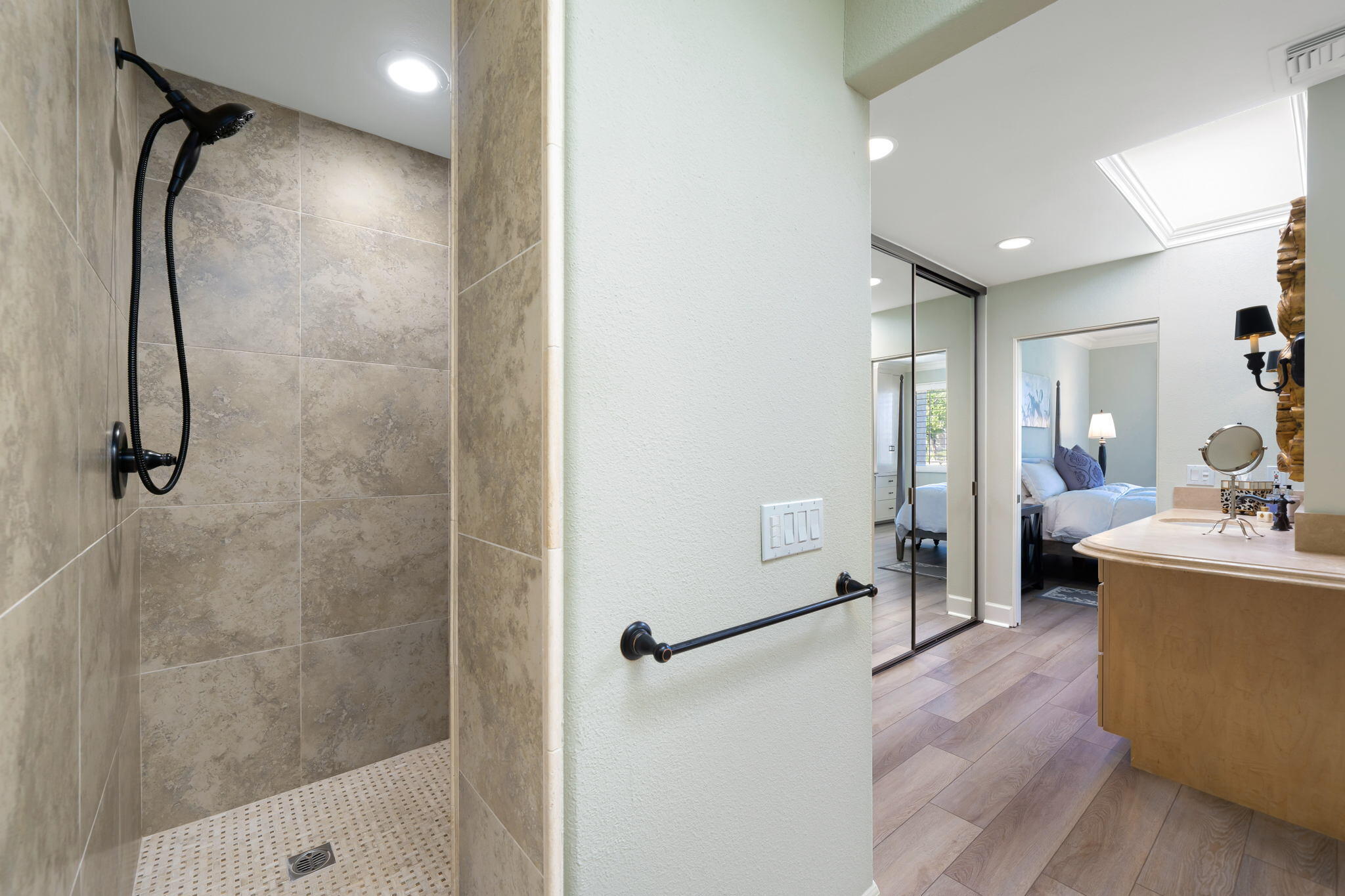818 Inverness Drive Rancho Mirage, CA 92270 - Photo 30 of 43 a bathroom with a tub shower vanity and a mirror