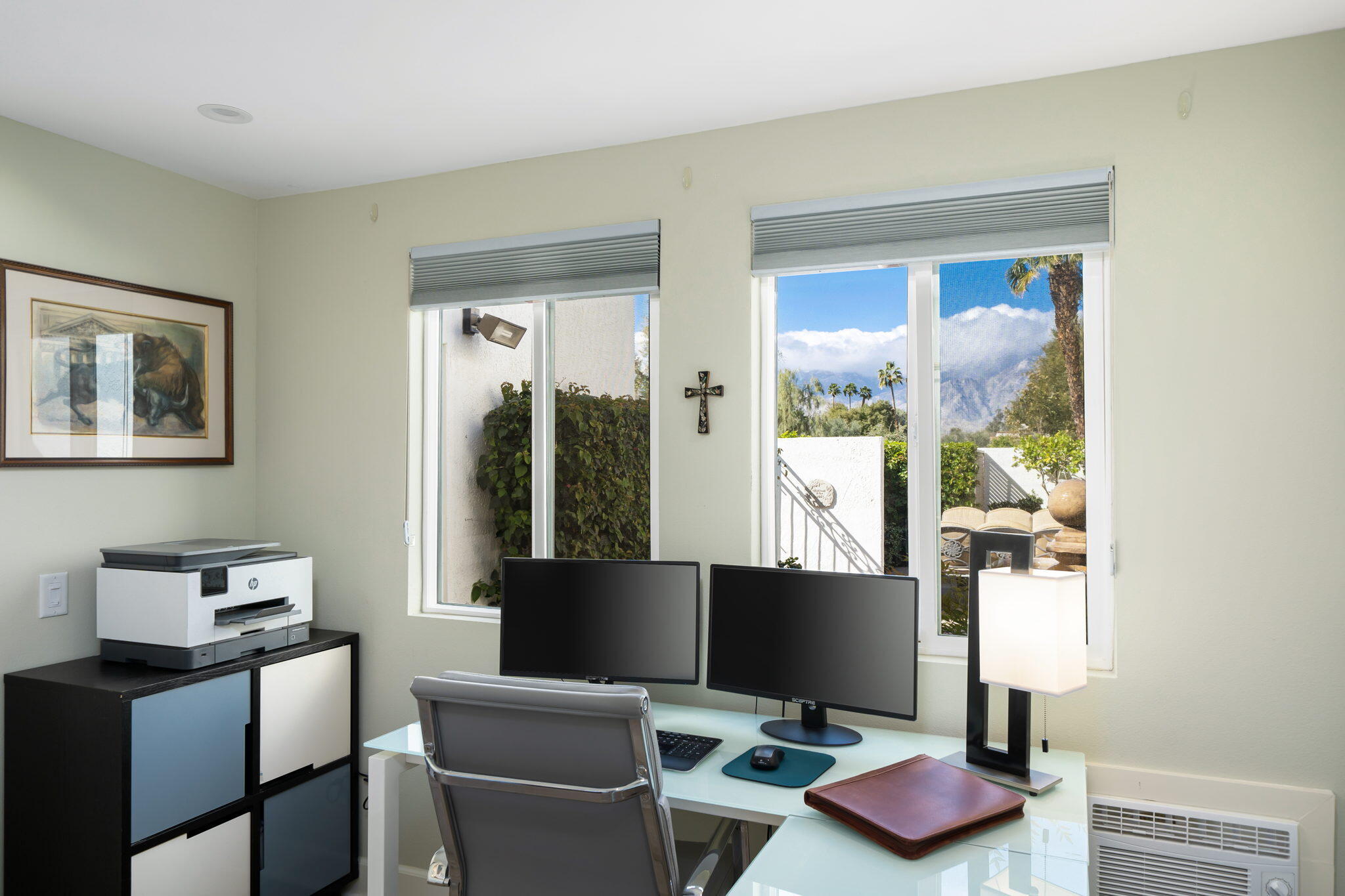 818 Inverness Drive Rancho Mirage, CA 92270 - Photo 37 of 43 a view of a workspace with furniture and a window