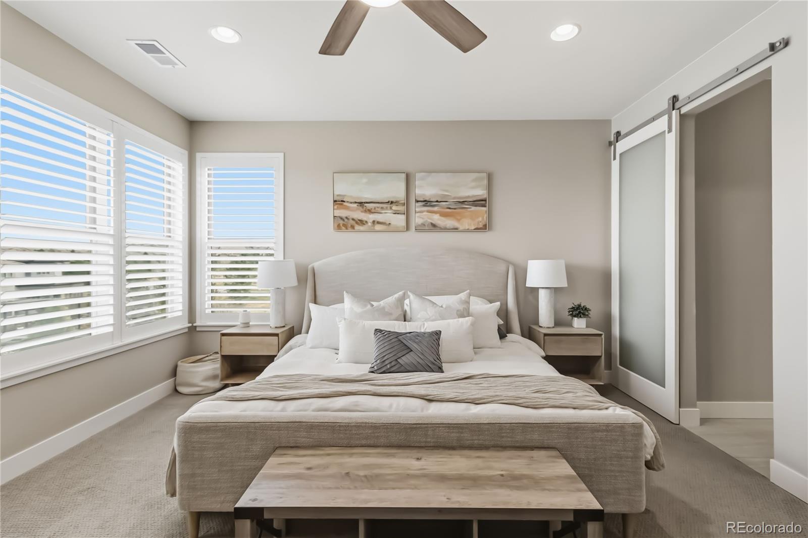489 Meadowleaf Lane Highlands Ranch, CO 80126 - Photo 22 of 50 a bedroom with a bed and a window
