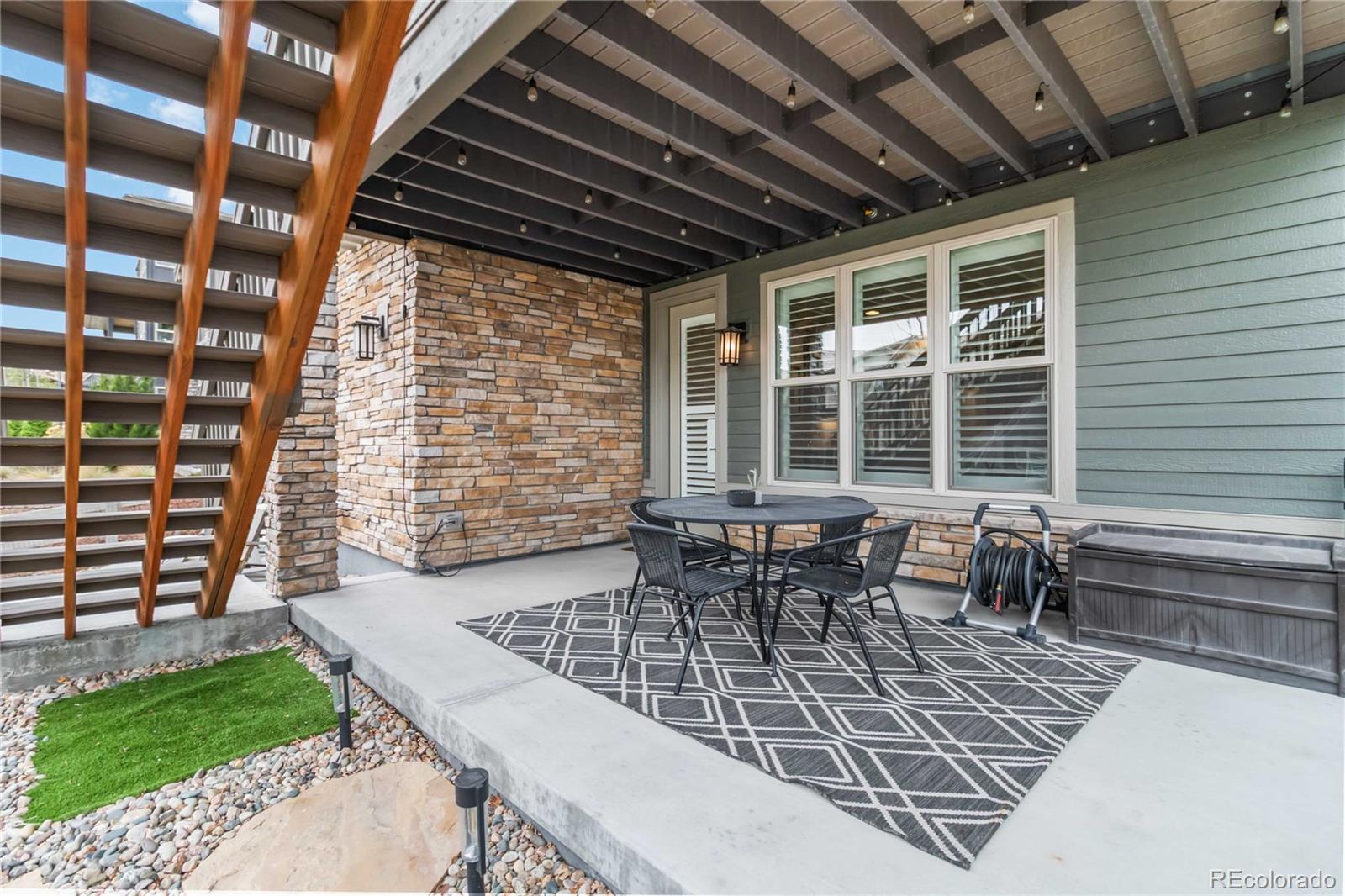 489 Meadowleaf Lane Highlands Ranch, CO 80126 - Photo 47 of 50 a outdoor dining space with furniture