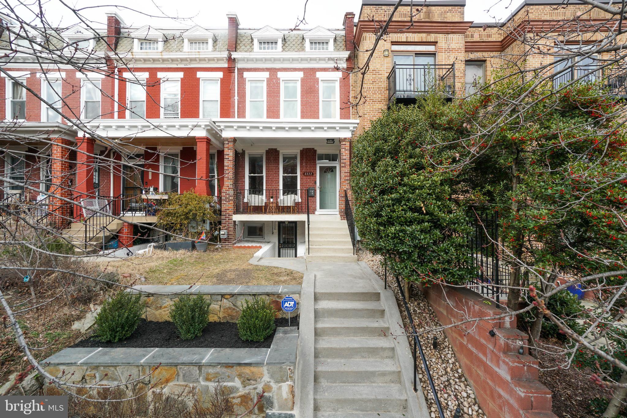 1111 Fairmont Street Northwest Washington, DC 20009 - Photo 2 of 55 Classic Porchfront Rowhome w Elevated Curb Appeal