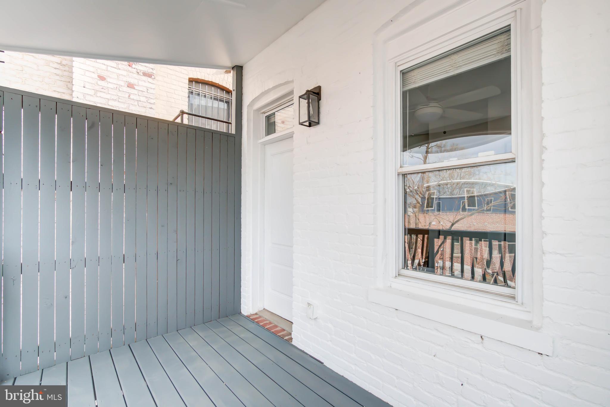 1111 Fairmont Street Northwest Washington, DC 20009 - Photo 38 of 55 Deck w Privacy Screen off Third Bedroom