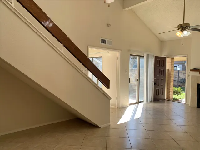 a view of an entryway with stairs