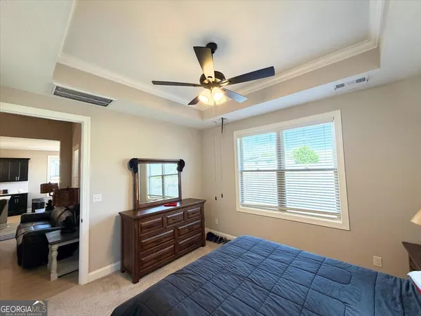 a room with furniture and a window