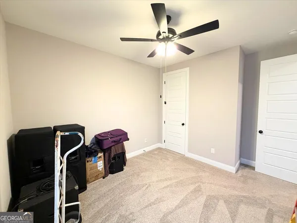 a view of a workspace with furniture