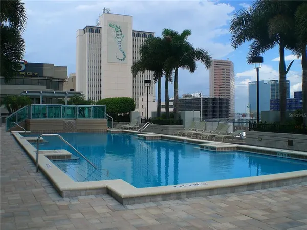 a view of a house with swimming pool