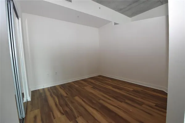 a view of small space with wooden floor