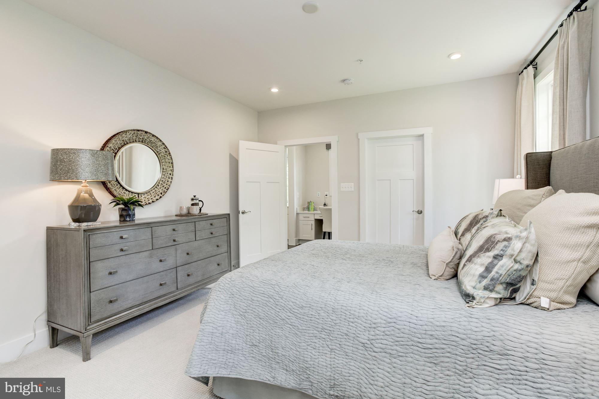 1713 Copperleaf Boulevard Hanover, MD 21076 - Photo 21 of 48 a bedroom with a bed and a dresser