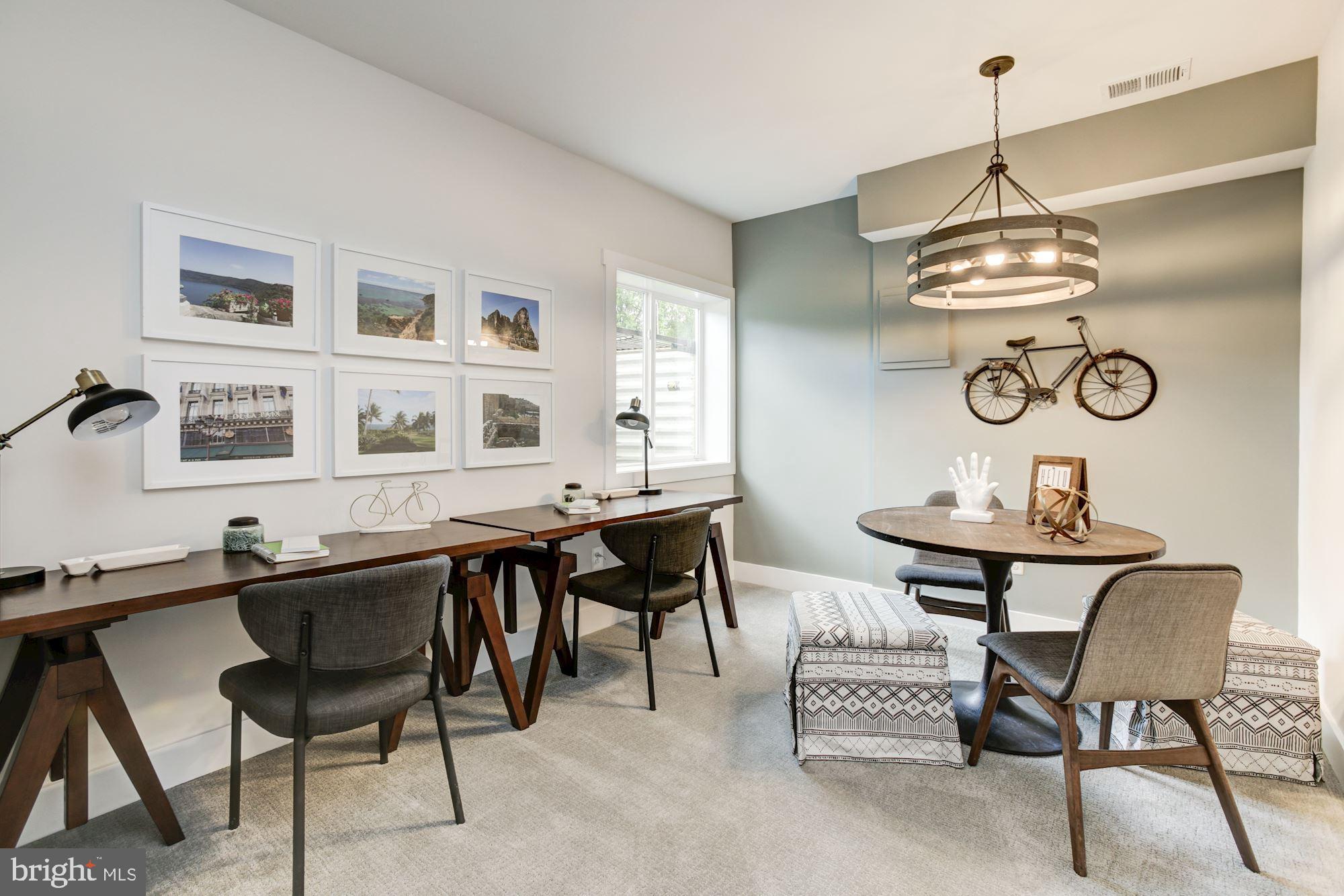 1713 Copperleaf Boulevard Hanover, MD 21076 - Photo 43 of 48 a table and chairs in a room