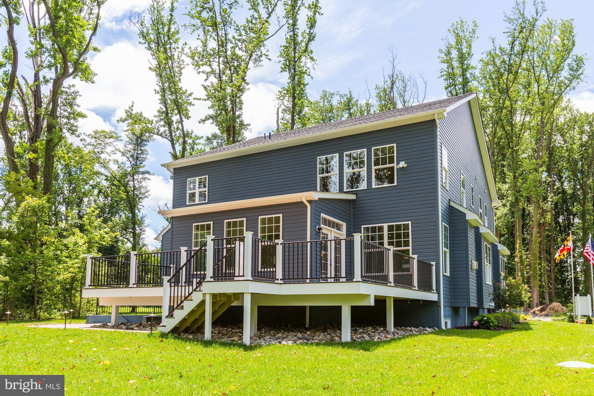 1713 Copperleaf Boulevard Hanover, MD 21076 - Photo 48 of 48 a front view of a house with a yard