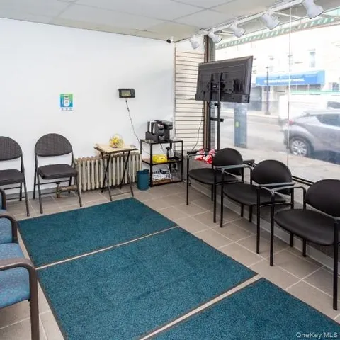 a living room filled with furniture and a table
